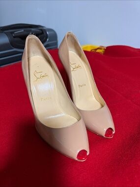 Christian Louboutin Nude Patent Peep-Toe Pumps with Red Soles